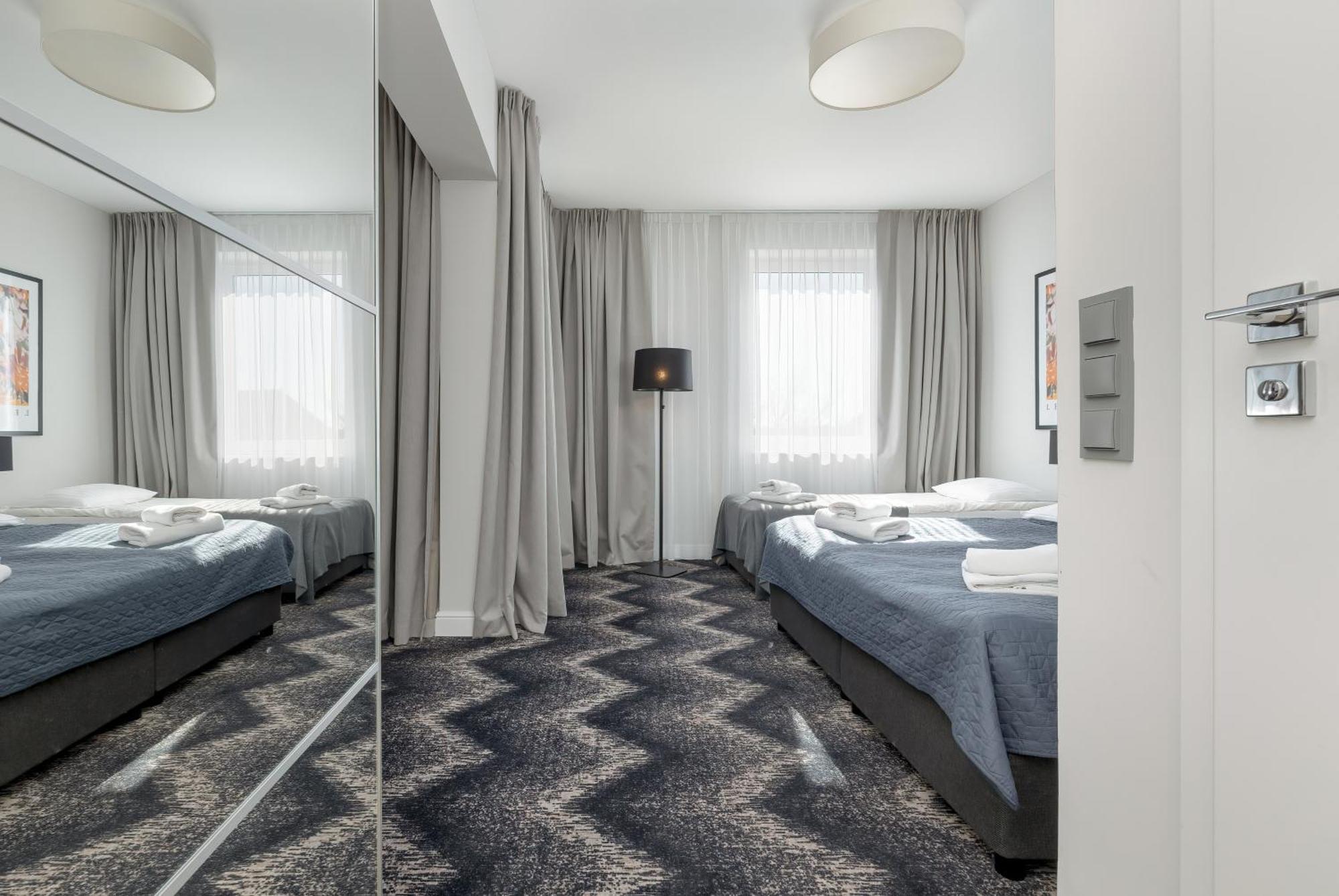 Aparthotel Etna Колобжег Номер фото