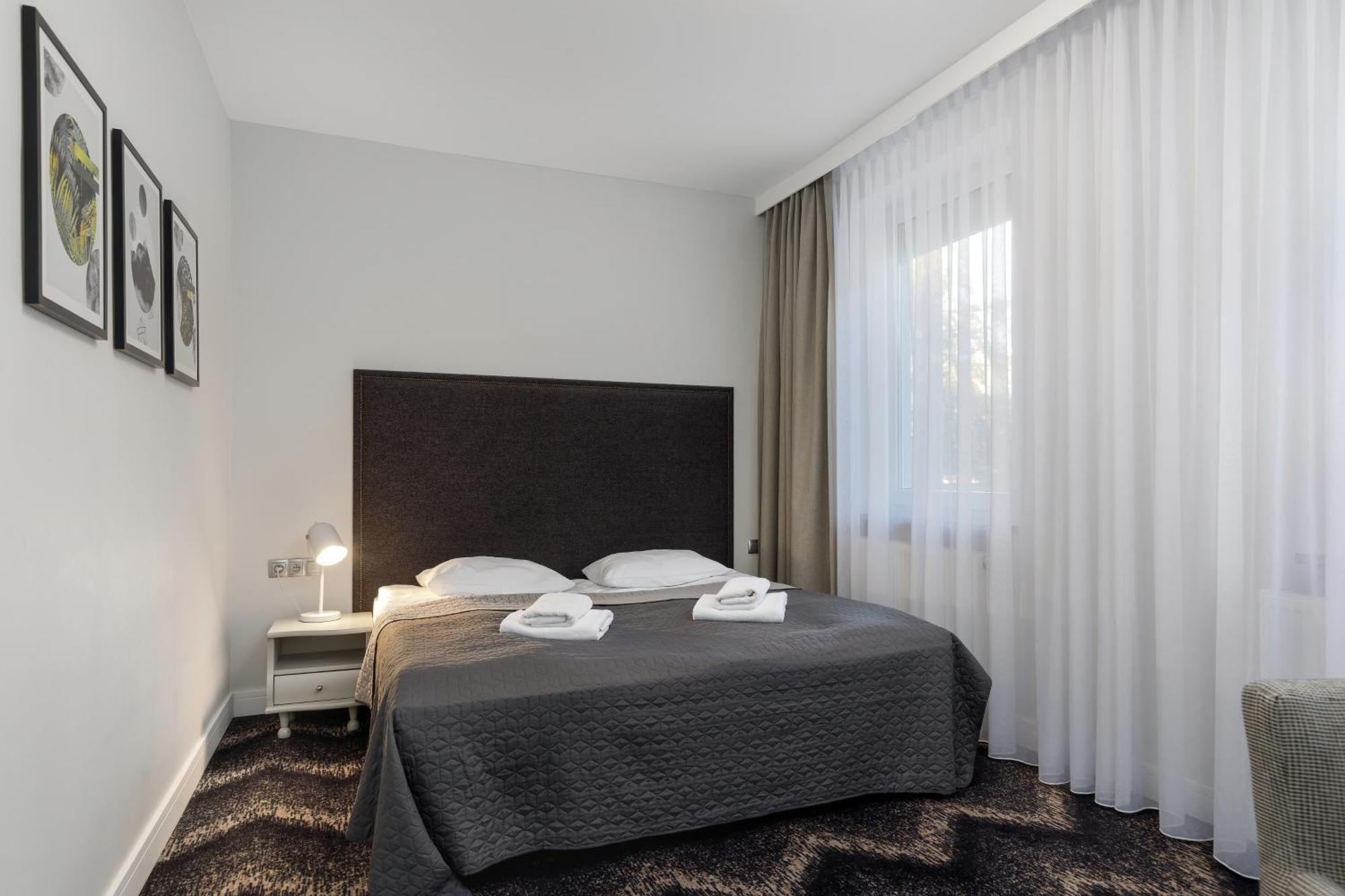 Aparthotel Etna Колобжег Номер фото